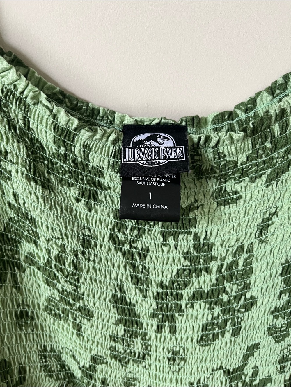 Jurassic Park Smocked Tiered Dress in Green Tropical Print with Velociraptors - Picture 6 of 7